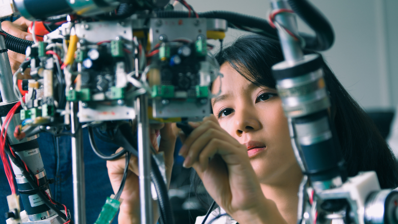 Woman working with technology in East Asia